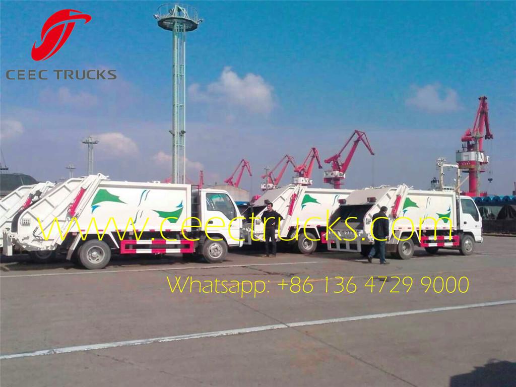 ISUZU 5cbm garbage compactor trucks at shanghai seaport ISUZU 5cbm garbage compactor trucks at shanghai seaport