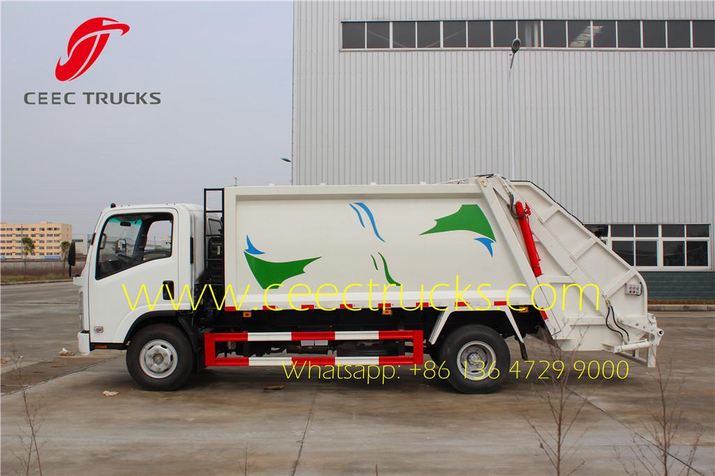 ISUZU 8cbm refuse comression truck side view ISUZU 8cbm refuse comression truck side view