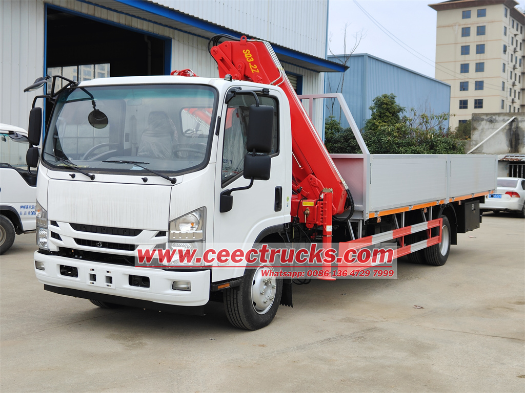 Isuzu dropside cargo truck with crane