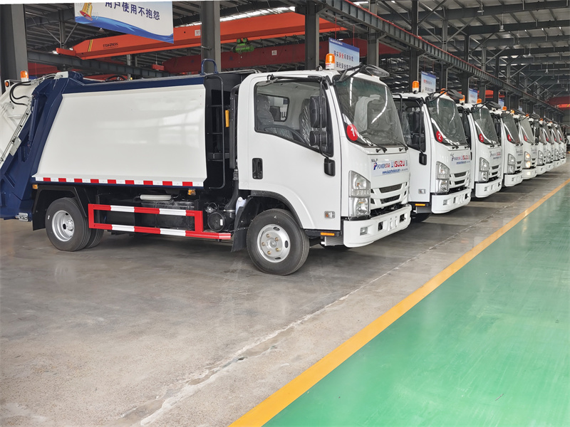 Isuzu NPR garbage compactor truck