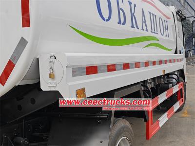 Isuzu water hauling tanker truck